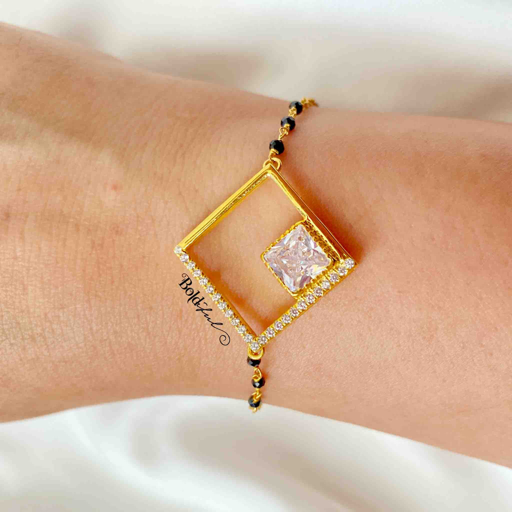 Elegant Bhaiya Bhabhi Pearl Lumba Mangalsutra Bracelet Rakhi With Roli – I  Jewels